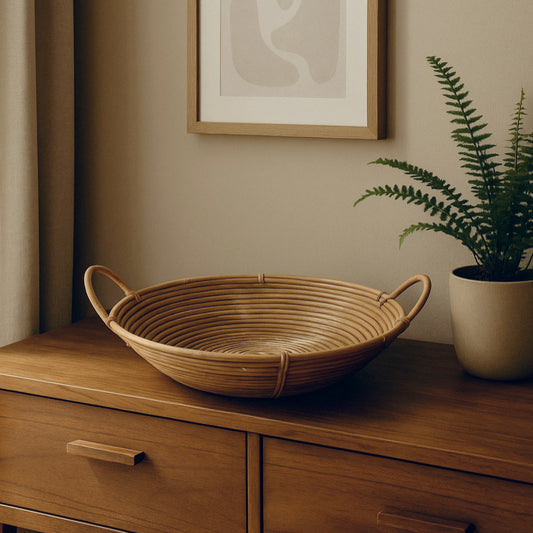 Cesto rotondo in rattan intrecciato con manici